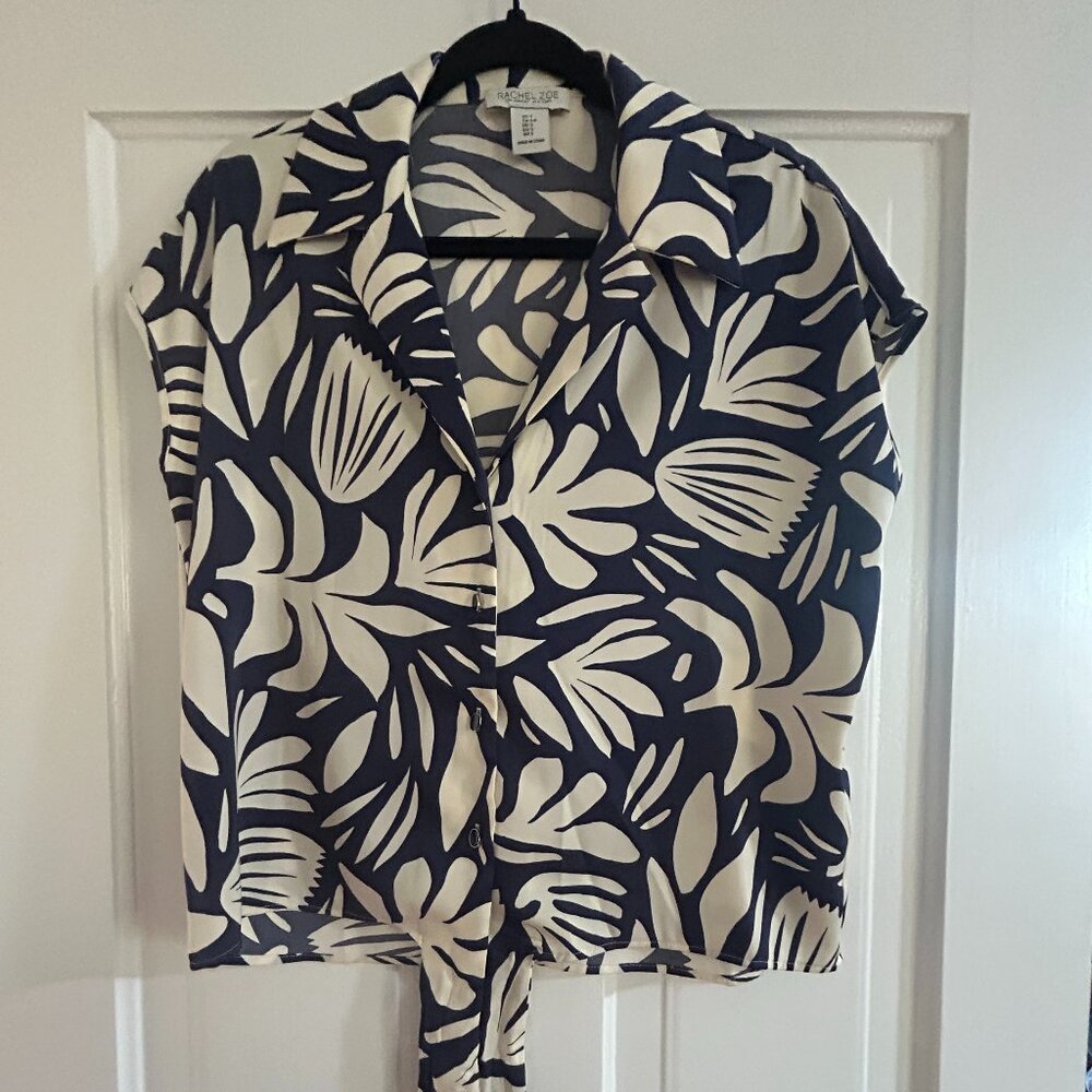 Rachel Zoe sleeveless button-front tie-waist blouse in a navy and cream tropical